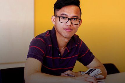 Male student studying in the classroom