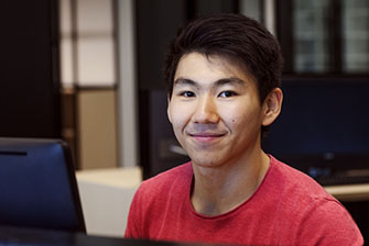 Student happy sitting studying