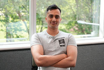 Student sitting near window