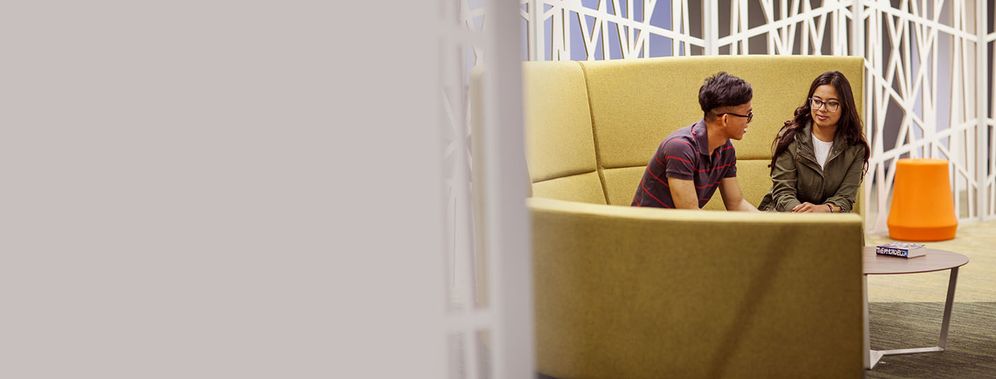 Students sitting inside couch