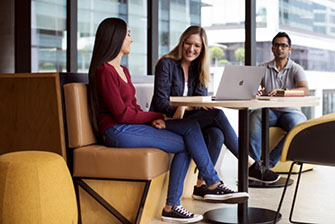 Students sitting inside couch