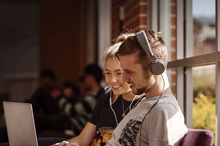 Students together headphones